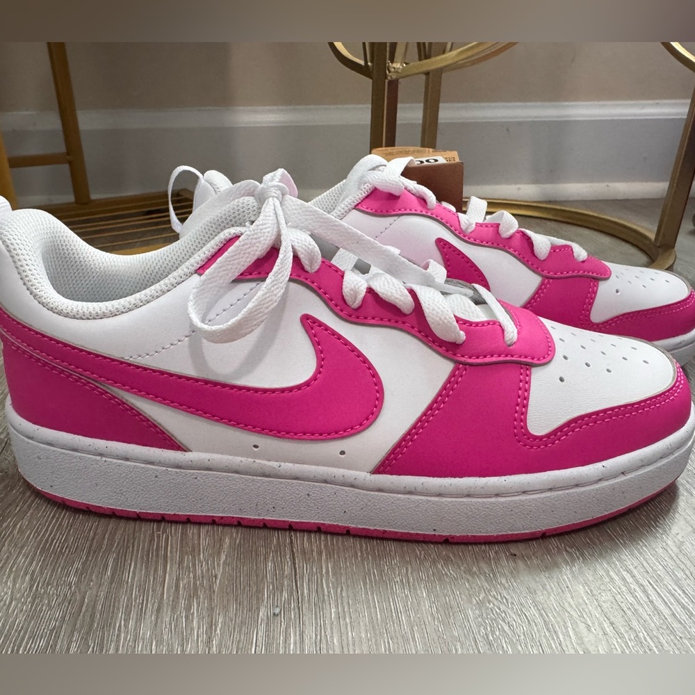 Nike Court Borough Low Recraft sneakers in White and Laser Fuchsia.